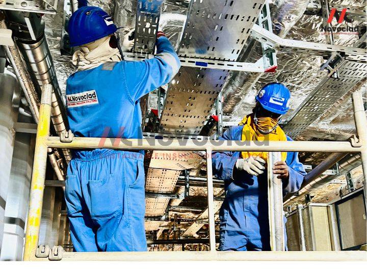 Novoclad Teams Working Insulation Ship Marine Cladding